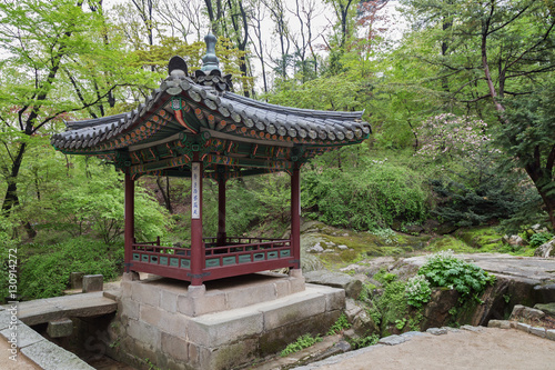 Ornate pavilion and verdant nature at Huwon  Secret Garden  at the Changdeokgung Palace in Seoul  South Korea.