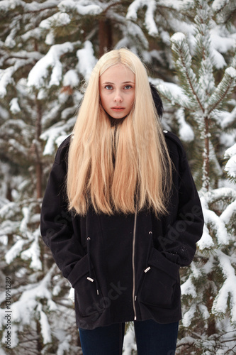 girl in a snowy winter forest. slum © makam1969