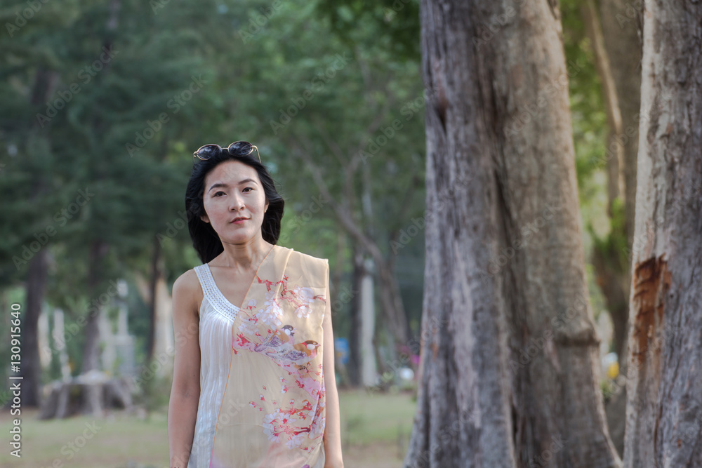 Portrait of beautiful young asian woman with scarf summer vacati Portrait of beautiful young asian woman with scarf summer vacati