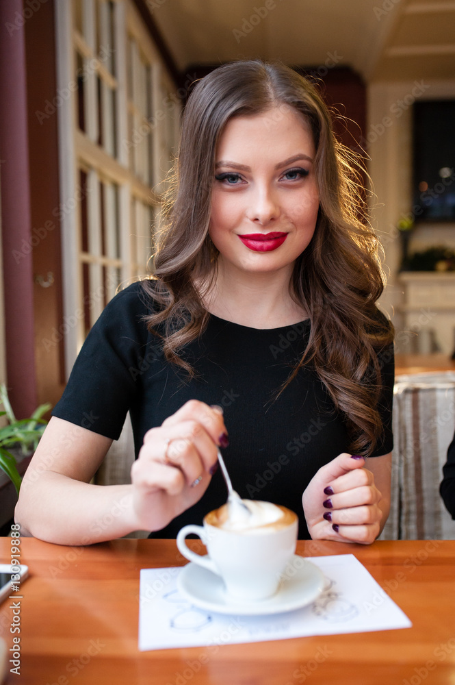 Beautiful girl drinking coffee Beautiful girl drinking coffee