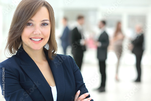 Free Download Portrait of a business woman looking happy and smiling - GFXLoad