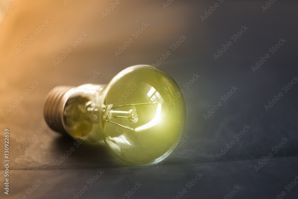 Electric light bulb burning Stock Photo Adobe Stock