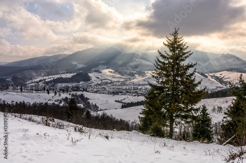 stormy weather over rural area in mountains