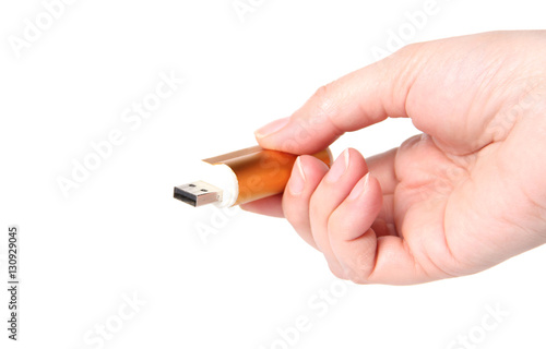 Hand holding USB