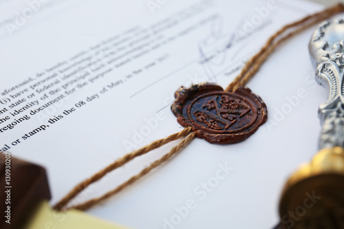 Old notarial wax stamp on document, closeup