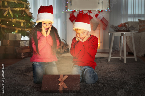 Cute little kids in Santa h...