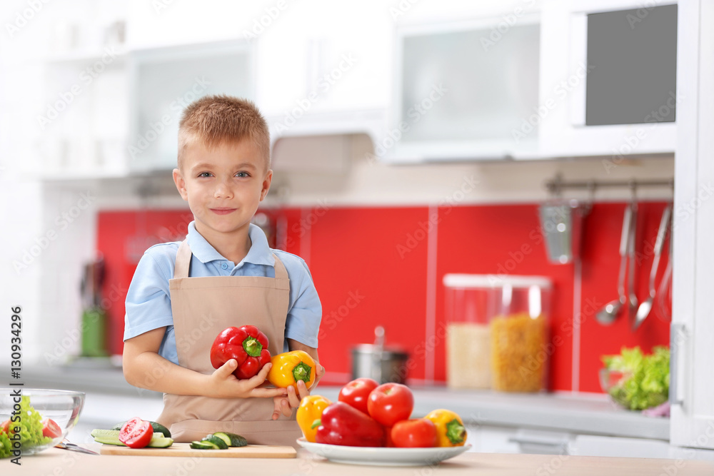 Little boy cooking in the kitchen Little boy cooking in the kitchen