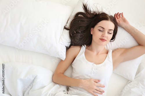 Young attractive woman slee...