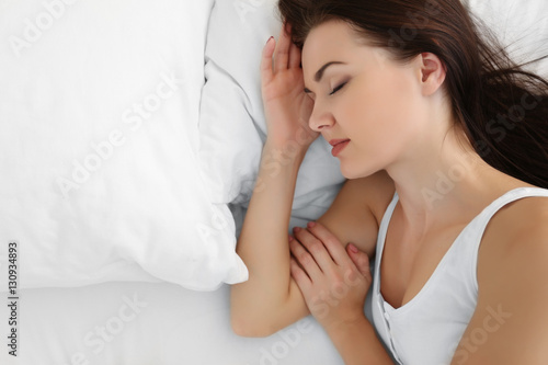 Young attractive woman slee...