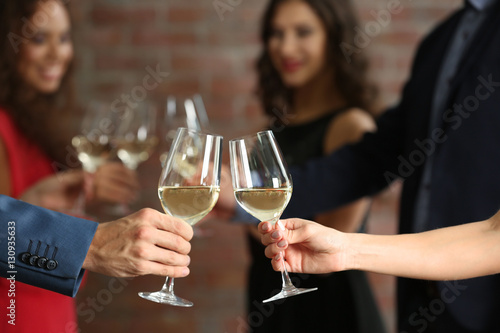 Female and male hands toast...