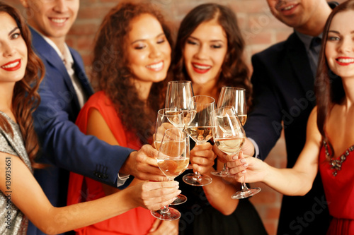 People toasting with glasse...