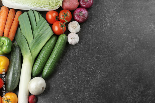 Fresh vegetables on color background