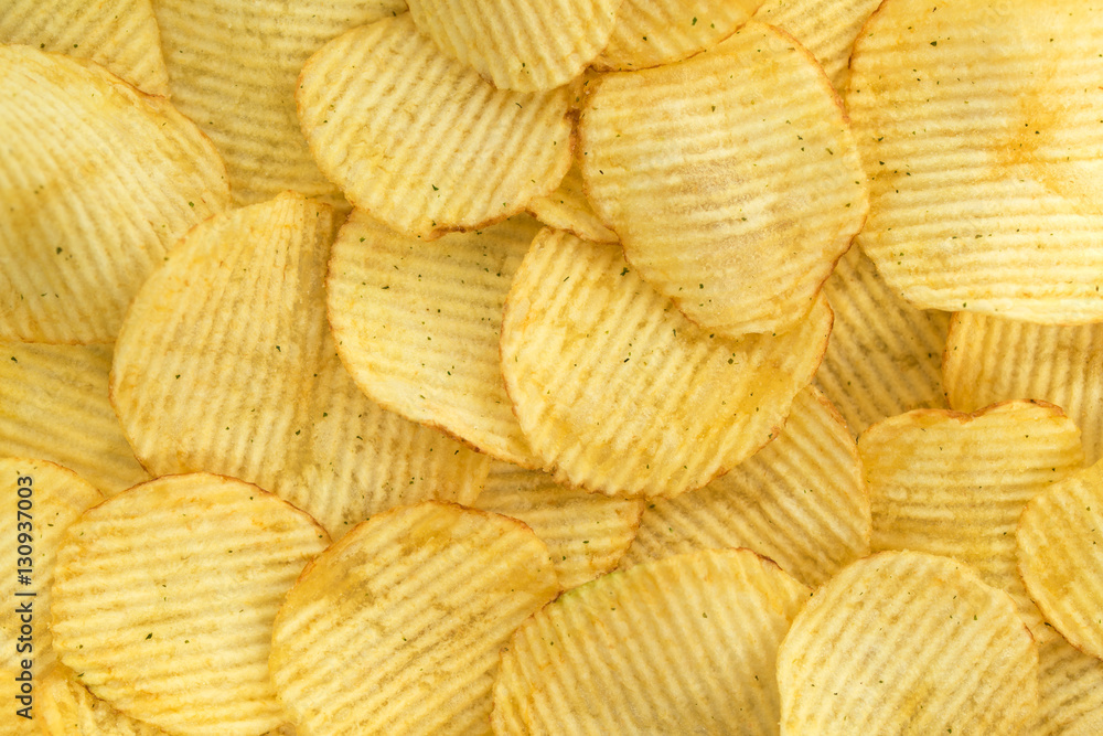 Potato chips, food background, top view Potato chips, food background, top view
