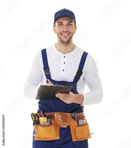 Plumber in uniform holding ...
