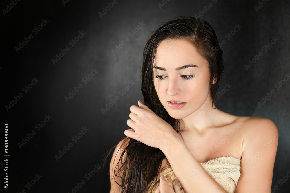Young beautiful woman in towel after shower Young beautiful woman in towel after shower