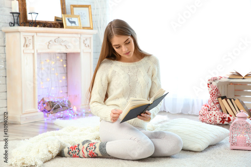Beautiful young woman readi...