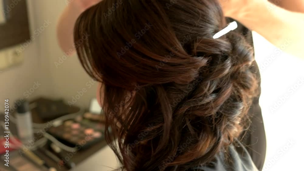 Brush applying makeup on woman. Smiling face of lady. Bride gets ready for ceremony. Charming look and good mood. Brush applying makeup on woman. Smiling face of lady. Bride gets ready for ceremony. Charming look and good mood.