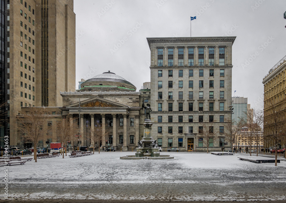 Old Buildings in Place d'Armes with snow - Montreal, Quebec, Canada