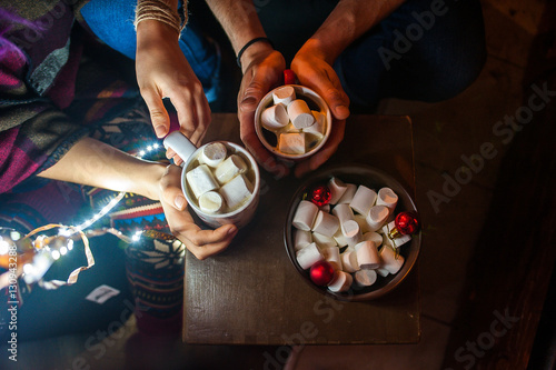 Young couple drinking cocoa