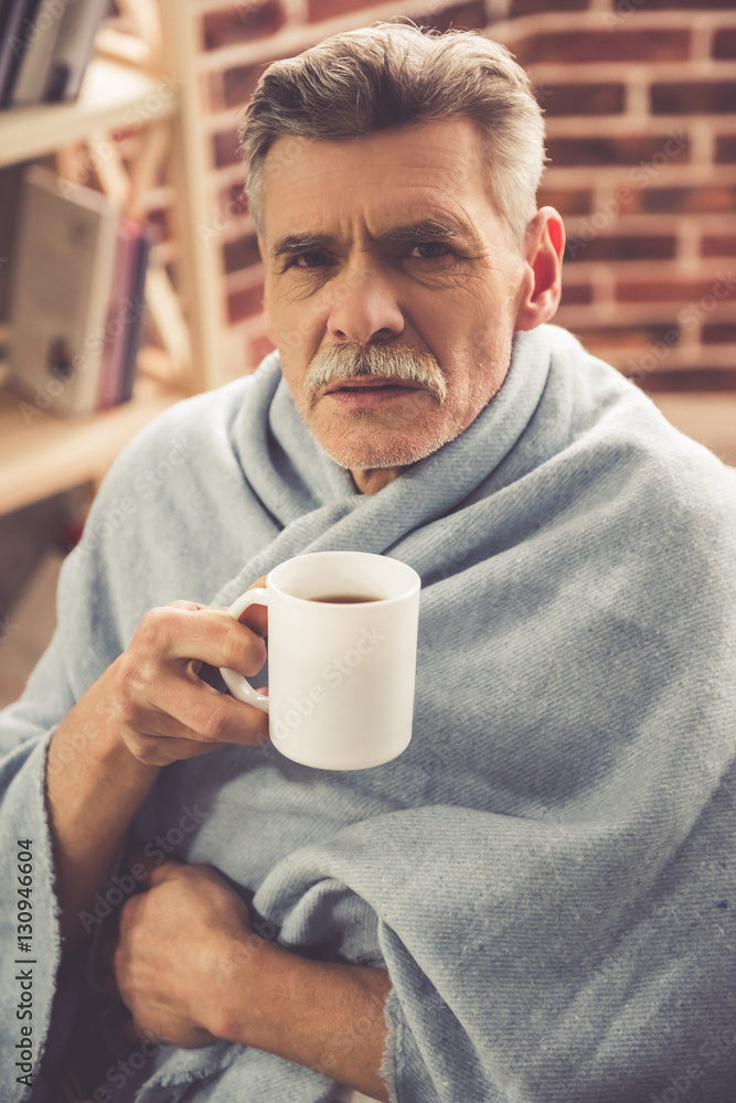 Mature man having a cold Mature man having a cold