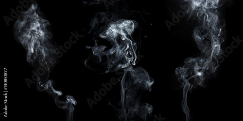 set of white smoke on black background photo
