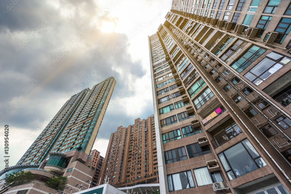 Obraz premium low angle view of Hong Kong apartment block in China.