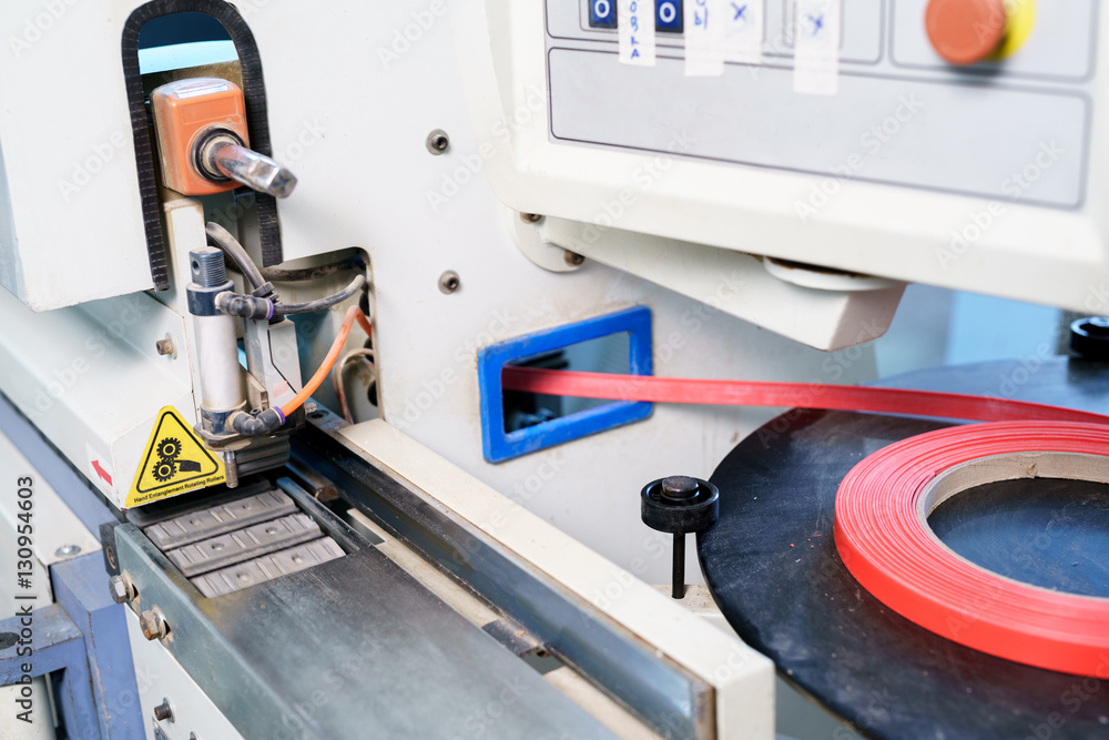Edge banding machine in production of furniture Edge banding machine in production of furniture