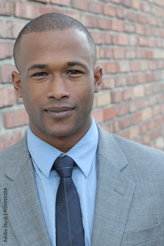 Man gracefully wearing a suit Man gracefully wearing a suit