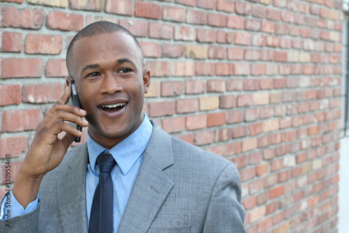 Businessman getting shocking news on the phone