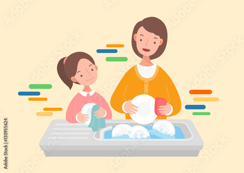 Mother and daughter washing the dishes.