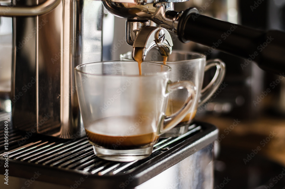 The process of making coffee from esprsso machine in cafe The process of making coffee from esprsso machine in cafe