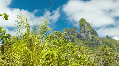 Bora Bora Island the Majestic Mount Otemanu in a Troppical French Polynesia South Pacific Green Nature Setting with Sunshine photo