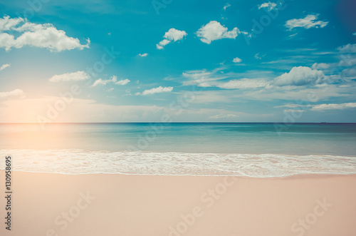 Tropical beach with blue sky and white cloud abstract background.