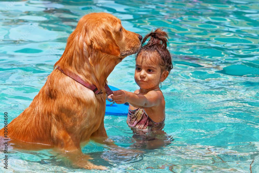 Funny photo of little baby swimming in outdoor pool, playing with ...