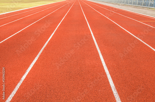 Red racetrack for competition in the stadium.