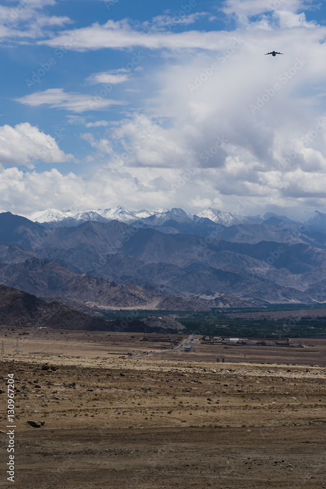 Ladakh landscape; barren cold desert of Ladakh with Himalayan mountains in the background.