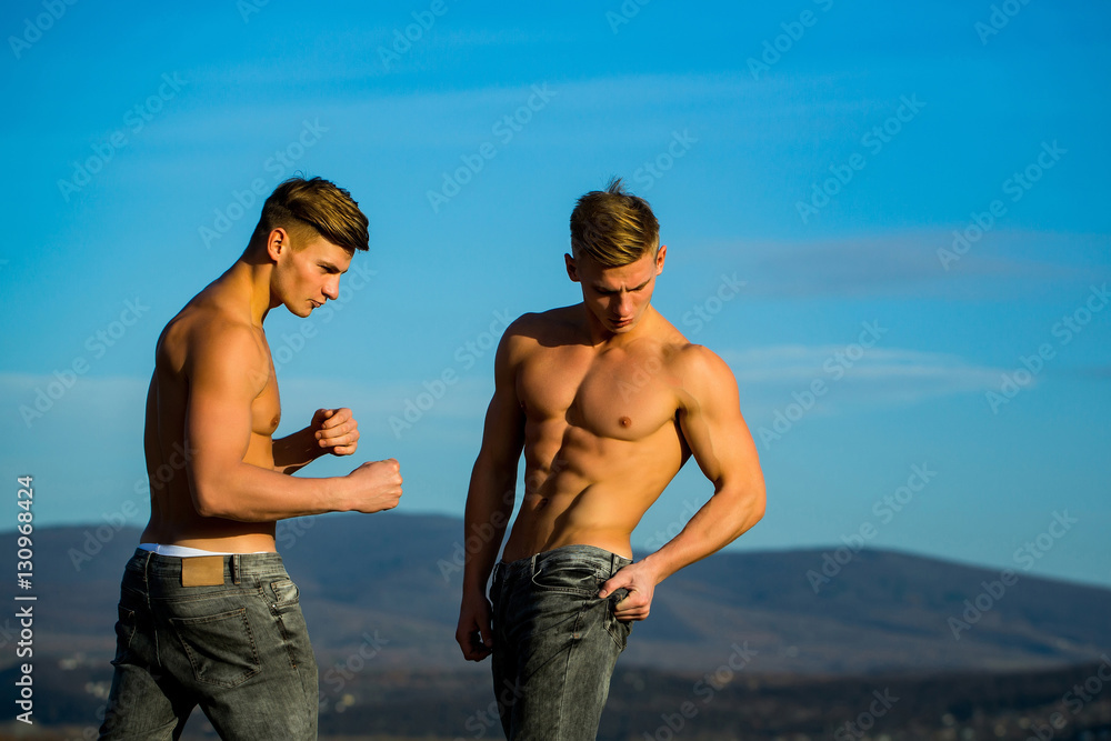 Handsome twin men or bodybuilders Handsome twin men or bodybuilders