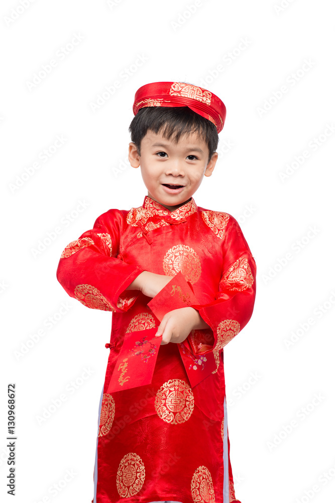 Little Vietnamese boy holding red envelops for Tet. The word mea Little Vietnamese boy holding red envelops for Tet. The word mea
