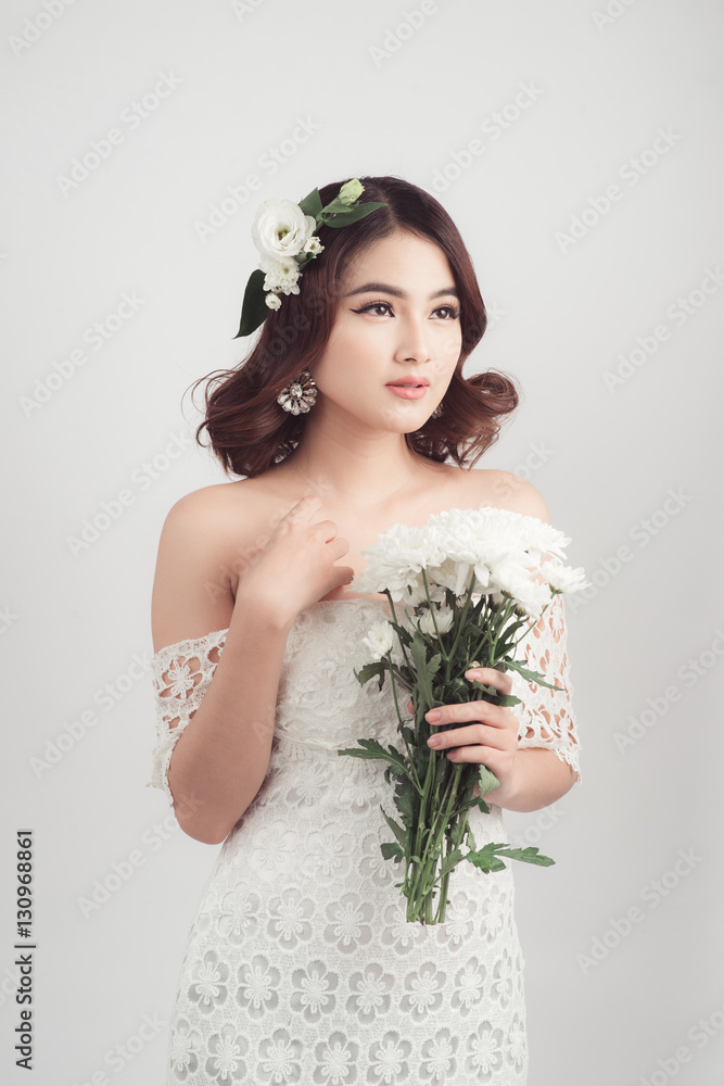 Beautiful asian woman bride on grey background Beautiful asian woman bride on grey background