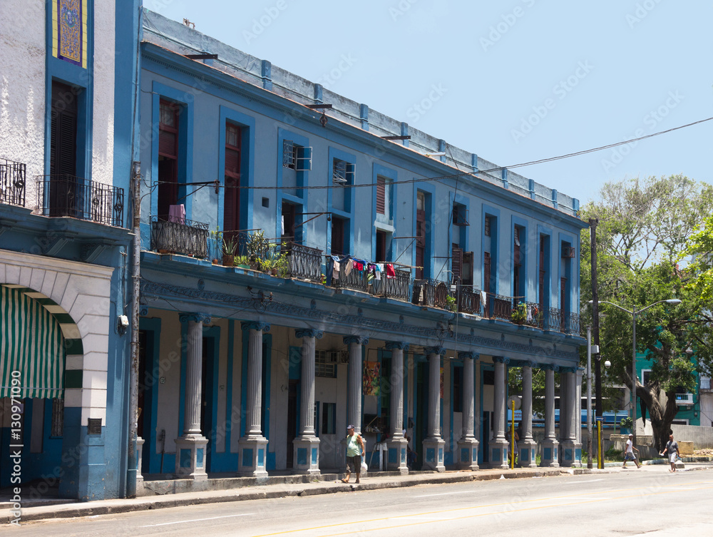 Retro blue house with columns in the downtown of Havana. Retro blue house with columns in the downtown of Havana.