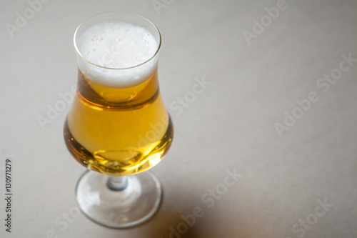Light beer on gray