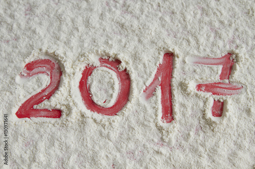 New year 2017 written on the flour background