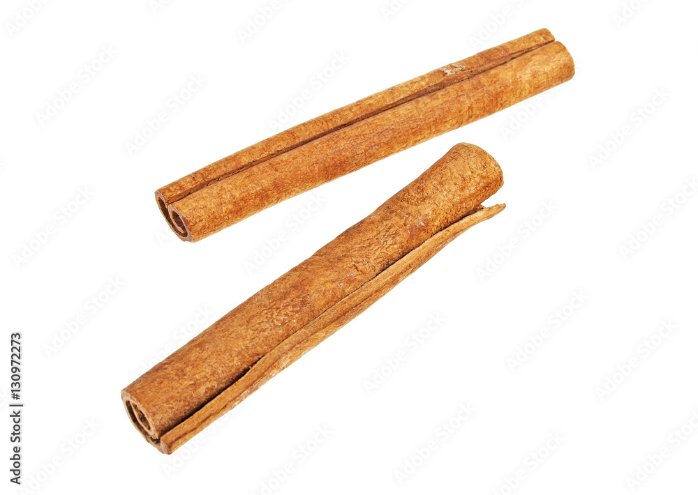 Two cinnamon sticks on white background Two cinnamon sticks on white background