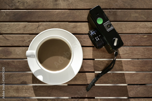 white coffee and old camera photo