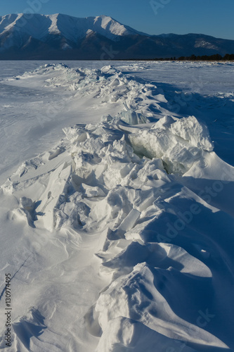 Ice hummocks of Lake Baikal and Holy Nose Peninsula.