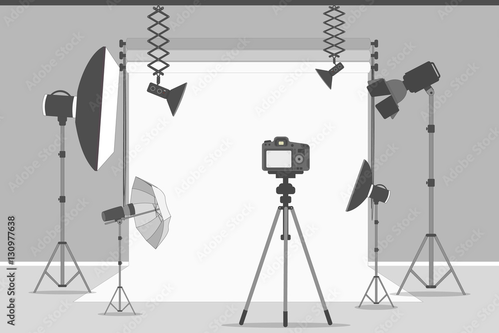 Simple photo studio. White background with lights and cameras.