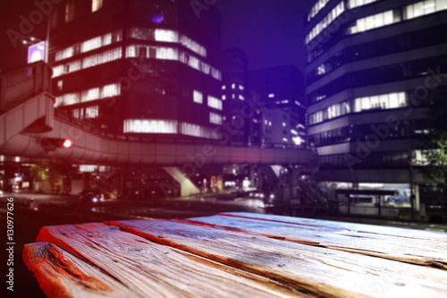 wooden desk and city landscape 