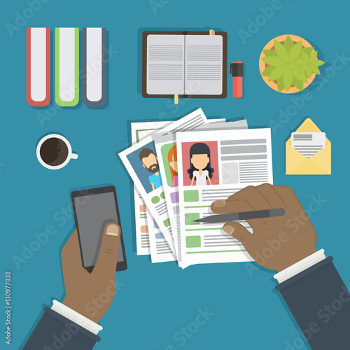 Supervising and accepting the resume. Director considering cv, finding new staff. Office desktop topview.