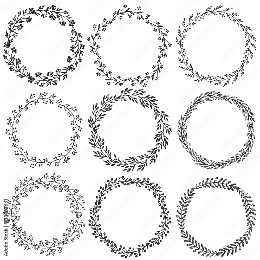 Set of hand drawn vector floral wreaths with leaves, flowers, berries.