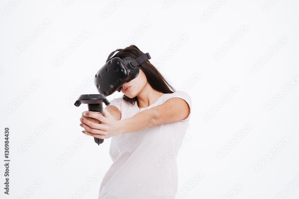 Attractive woman wearing virtual reality device